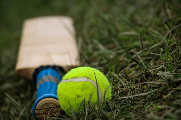 High-energy T10 tennis cricket match under lights